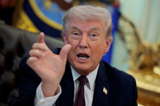 U.S. President Donald Trump speaks during the signing ceremony for an execituve order on mail ballots, in the Oval Office of the White House in Washington.